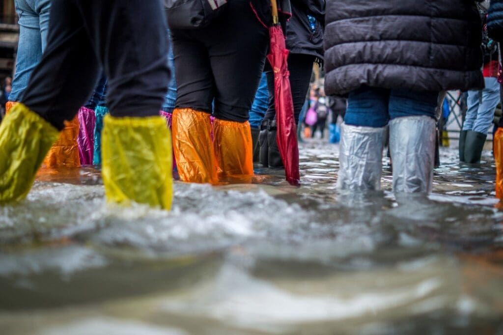 image-of-a-flooded-area-and-people-in-wellies