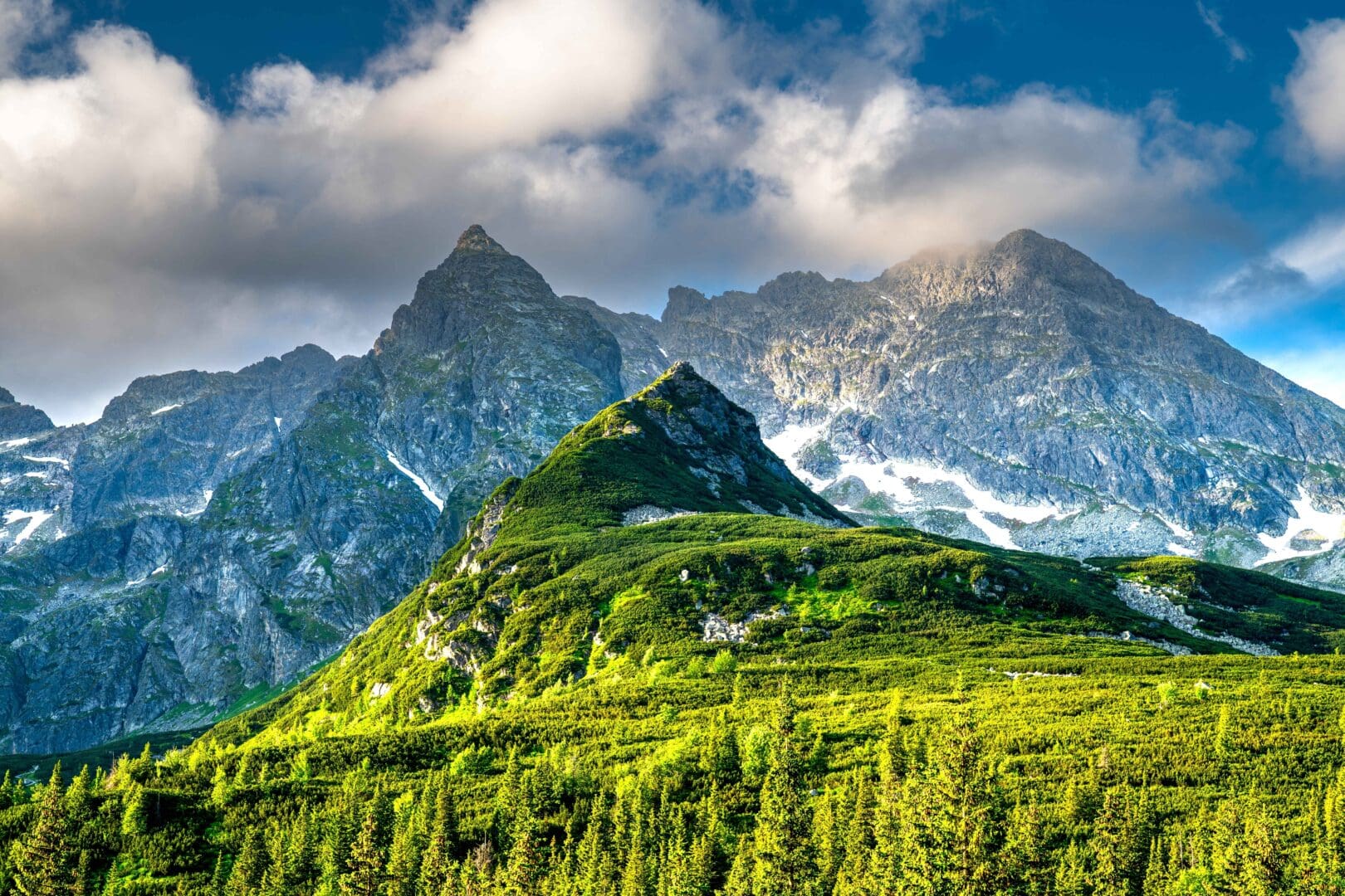 footer_stunning-mountain-landscape-snow-capped-peaks-background-stock-photo-2343384837-shutterstock-1
